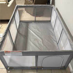 Gray Playpen with Mesh Sides